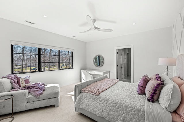 carpeted bedroom featuring ceiling fan