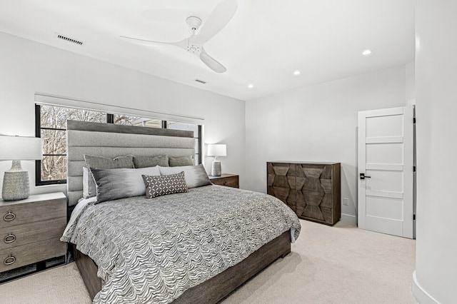 carpeted bedroom featuring ceiling fan