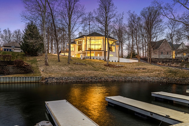 dock area featuring a water view