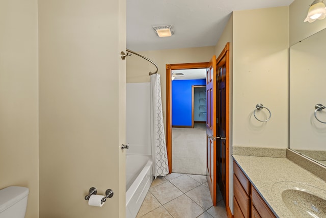 full bathroom featuring tile floors, large vanity, shower / bathtub combination with curtain, toilet, and ceiling fan