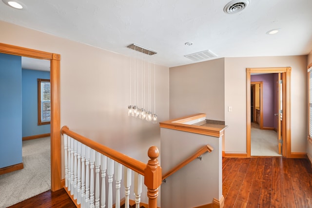 hall with dark hardwood / wood-style floors