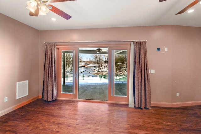 unfurnished room featuring dark hardwood / wood-style floors and ceiling fan