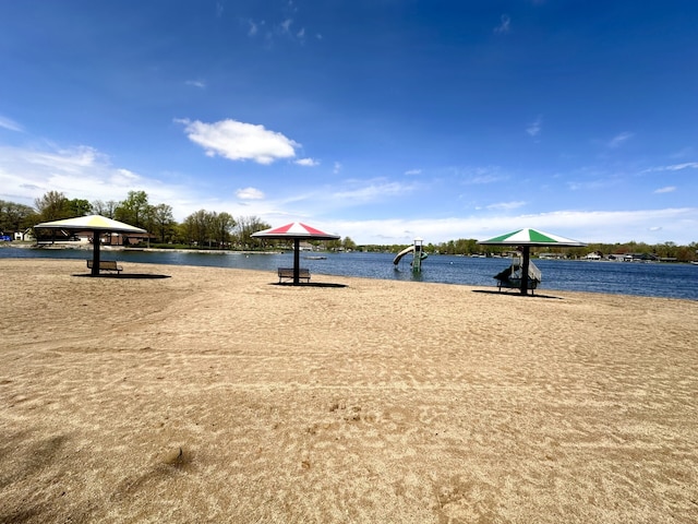 exterior space featuring a water view and a gazebo