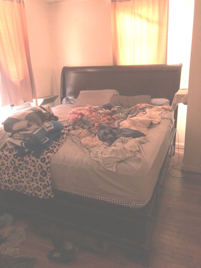 bedroom featuring dark hardwood / wood-style floors