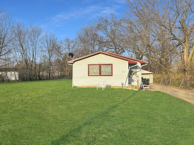 exterior space with a lawn