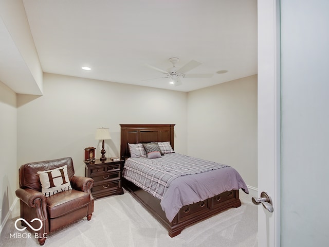 bedroom with ceiling fan and carpet