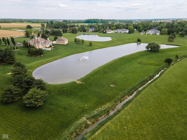 drone / aerial view with a water view and a rural view