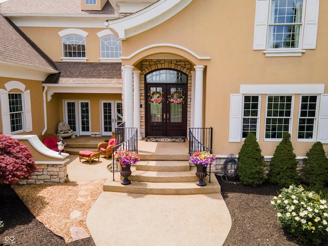 doorway to property with a patio and french doors