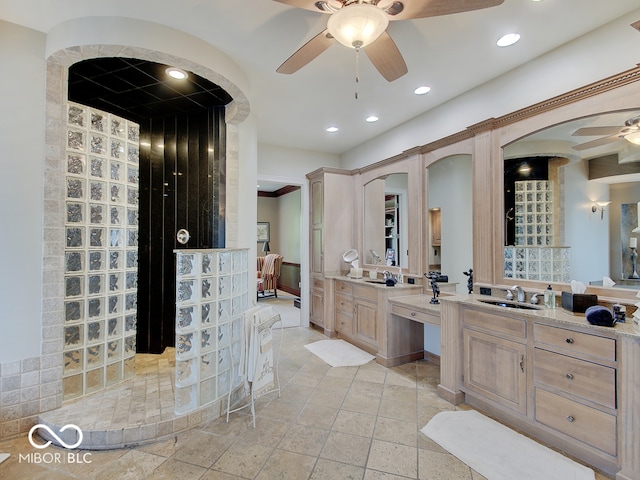 bathroom featuring vanity and ceiling fan