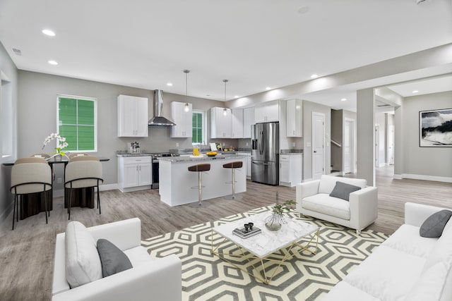 living room with light hardwood / wood-style floors