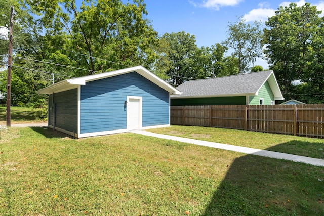 view of outdoor structure with a yard