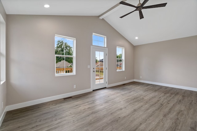 unfurnished room with light hardwood / wood-style floors, ceiling fan, high vaulted ceiling, and beamed ceiling