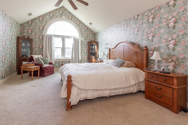 bedroom with light carpet, ceiling fan, and lofted ceiling