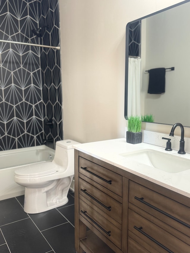 full bathroom with tile patterned flooring, shower / bath combo with shower curtain, toilet, and vanity