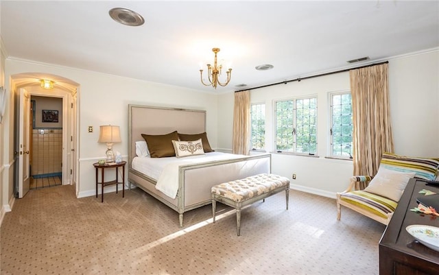 carpeted bedroom featuring an inviting chandelier and crown molding