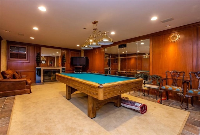 rec room featuring wood walls, pool table, and light tile floors