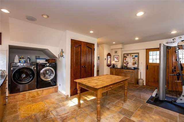 laundry room with washer and dryer and tile floors