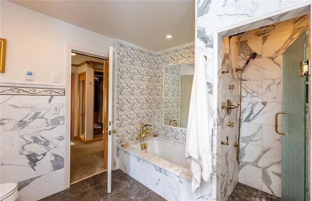 bathroom featuring toilet, tile floors, and independent shower and bath