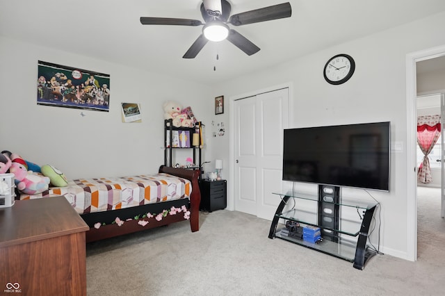bedroom with carpet and a ceiling fan