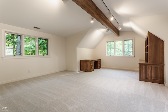 bonus room featuring vaulted ceiling with beams and light colored carpet