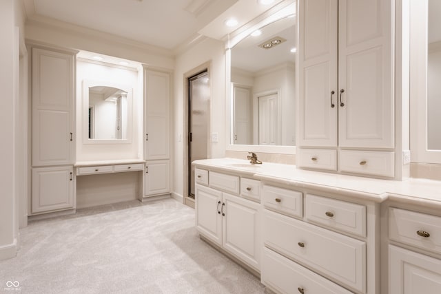 bathroom with vanity and ornamental molding