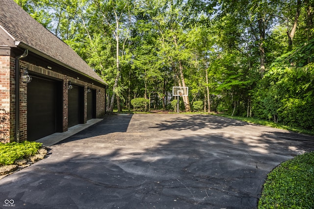 view of patio featuring a garage