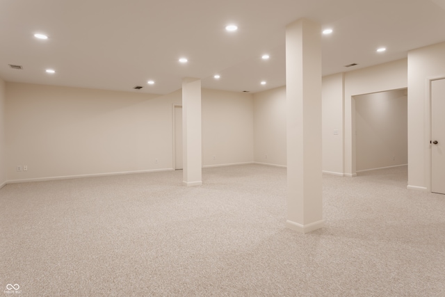 basement with light carpet