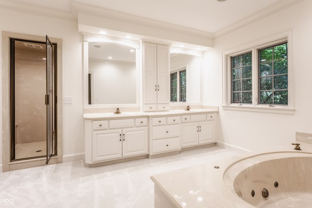 bathroom featuring crown molding, vanity, and independent shower and bath