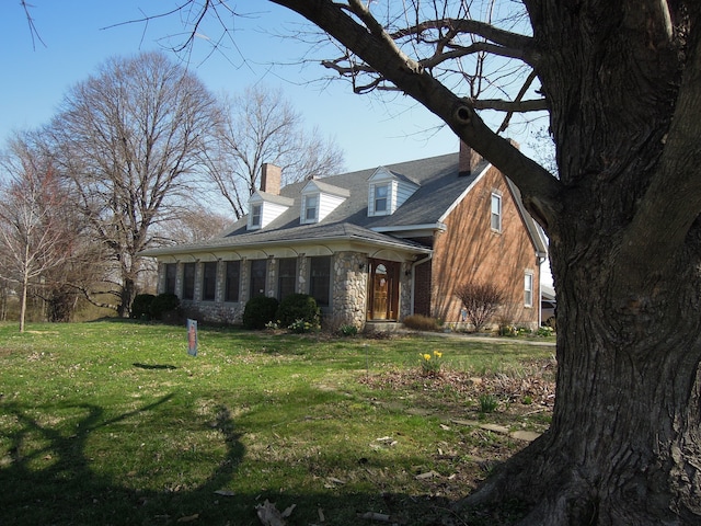 exterior space featuring a front lawn