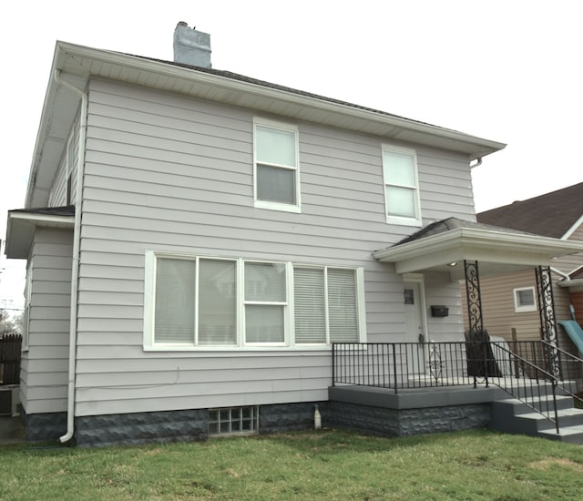 view of front facade featuring a front yard