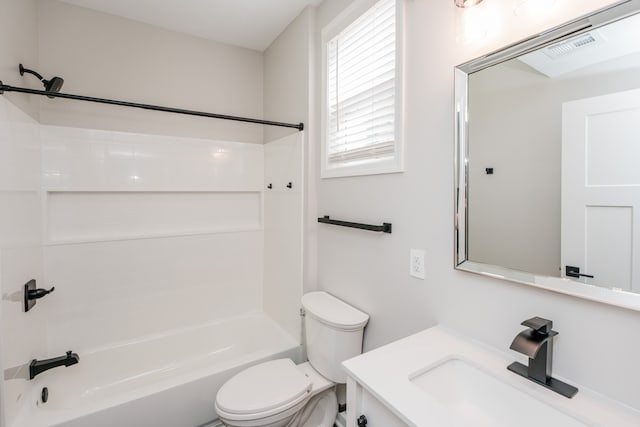 full bathroom with vanity, shower / tub combination, and toilet