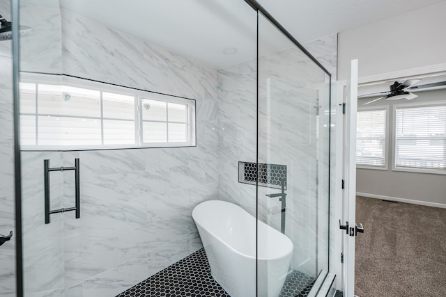 bathroom featuring shower with separate bathtub, a healthy amount of sunlight, and ceiling fan