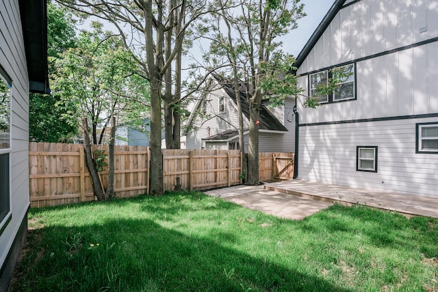 view of yard featuring a wooden deck