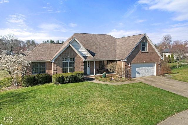 view of front of home featuring a garage and a front yard