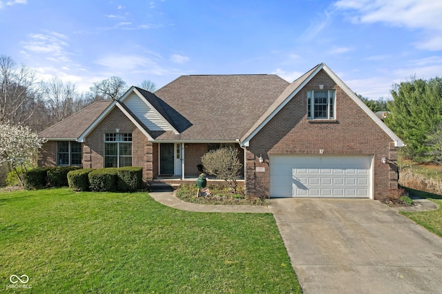 view of front of property featuring a garage and a front lawn