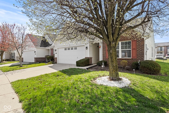 5220 Ariana Ct, Indianapolis, IN 46227 - view of property hidden behind natural elements featuring brick siding, an attached garage, a front yard, and driveway