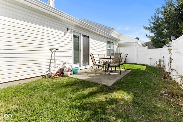 5220 Ariana Ct, Indianapolis, IN 46227 - fenced backyard with a patio