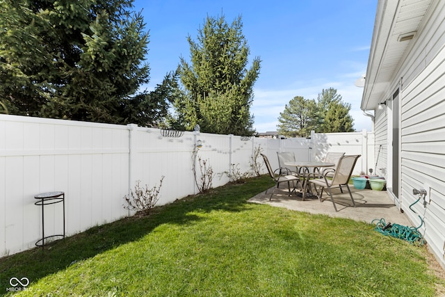 5220 Ariana Ct, Indianapolis, IN 46227 - fenced backyard with a patio area