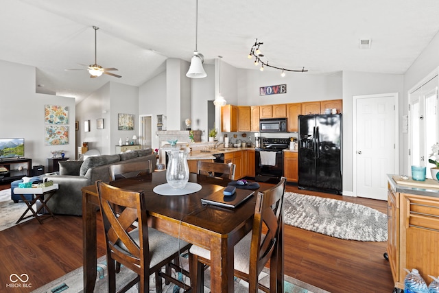 5220 Ariana Ct, Indianapolis, IN 46227 - dining room with dark wood finished floors, a ceiling fan, and high vaulted ceiling