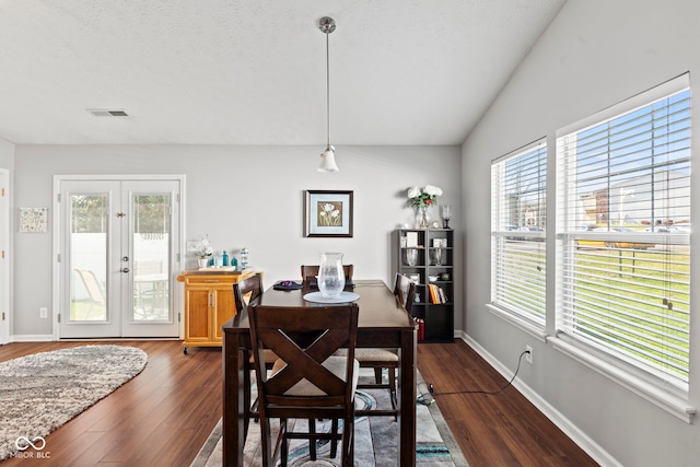 5220 Ariana Ct, Indianapolis, IN 46227 - dining room featuring dark wood-style floors, plenty of natural light, and vaulted ceiling
