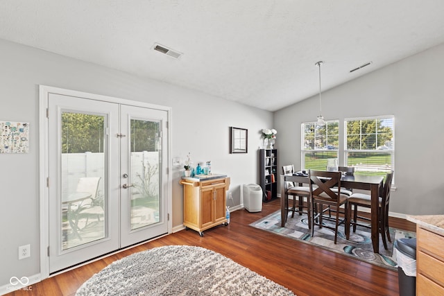 5220 Ariana Ct, Indianapolis, IN 46227 - dining area featuring french doors, vaulted ceiling, and dark wood-style floors