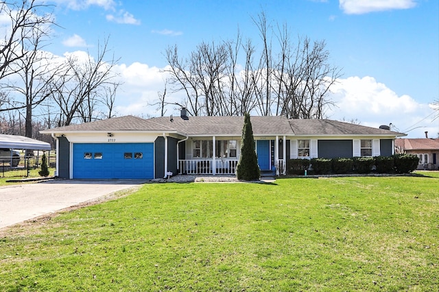 ranch-style house featuring a front lawn, covered porch, and a garage