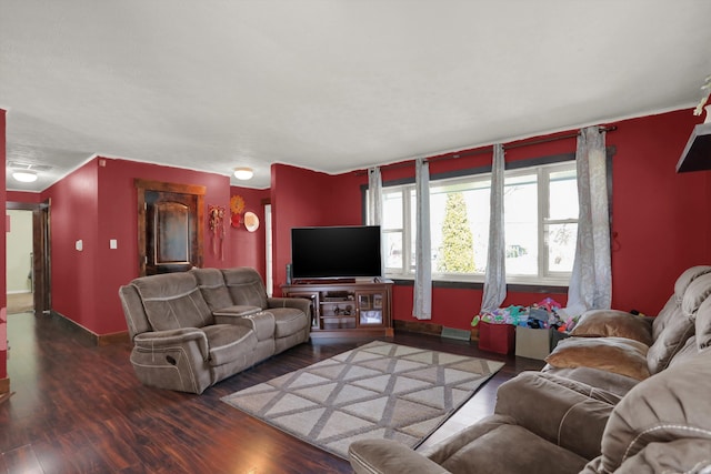 living room with dark hardwood / wood-style floors