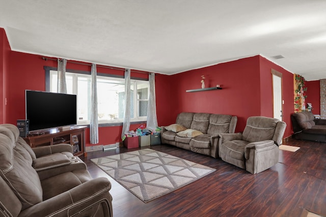 living room featuring dark hardwood / wood-style floors