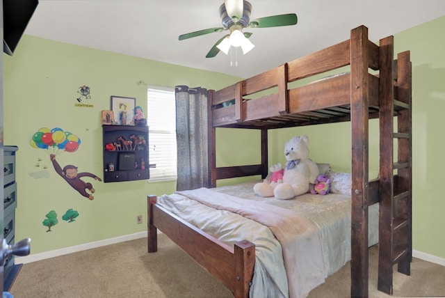 bedroom with light colored carpet and ceiling fan