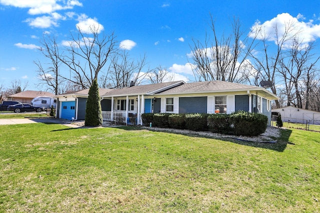 ranch-style home with a front lawn and a garage