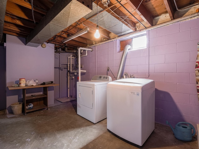 laundry room featuring washing machine and dryer