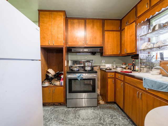 kitchen featuring stainless steel range with electric stovetop, dark tile floors, white refrigerator, and extractor fan