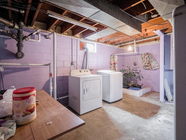 basement featuring washing machine and dryer