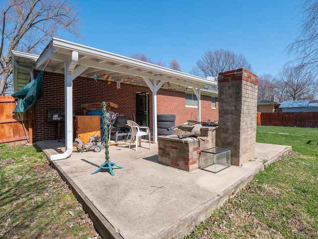 view of patio with a fire pit